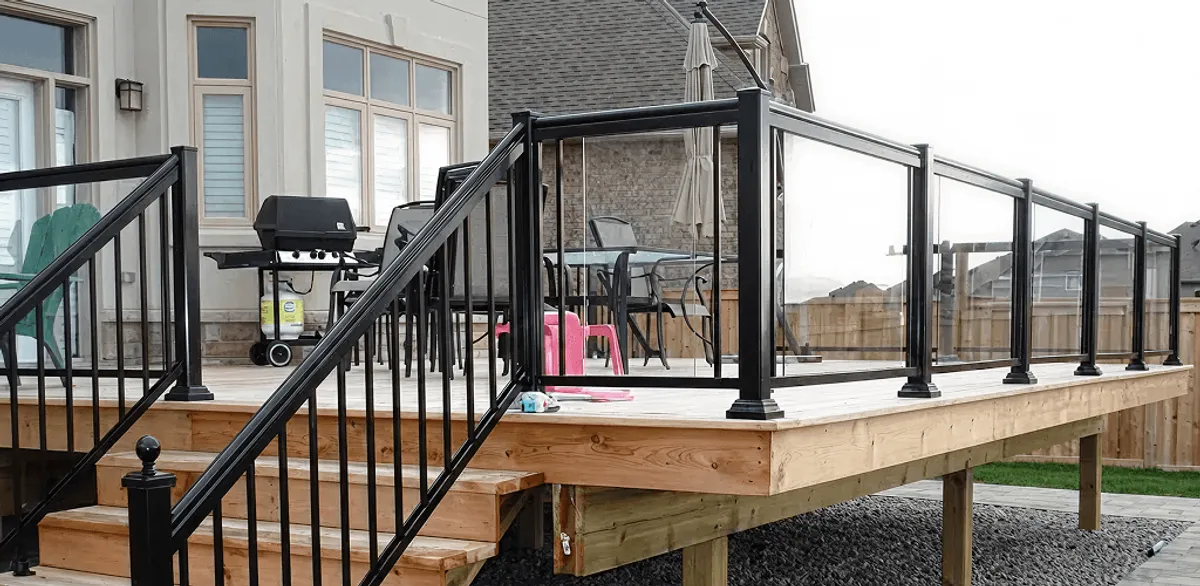 Handrail installation on a deck staircase for safety and code compliance in Portland, OR
